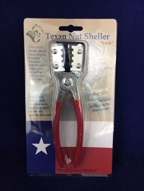 Alicate Texan Nut Sheller para noz pecan, de cabo vermelho, na embalagem com a bandeira do Texas